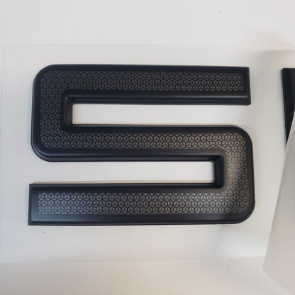 New Authentic SKEETER LG Black/Black Grid Emblem 91171629- 25" X 2 1/4"